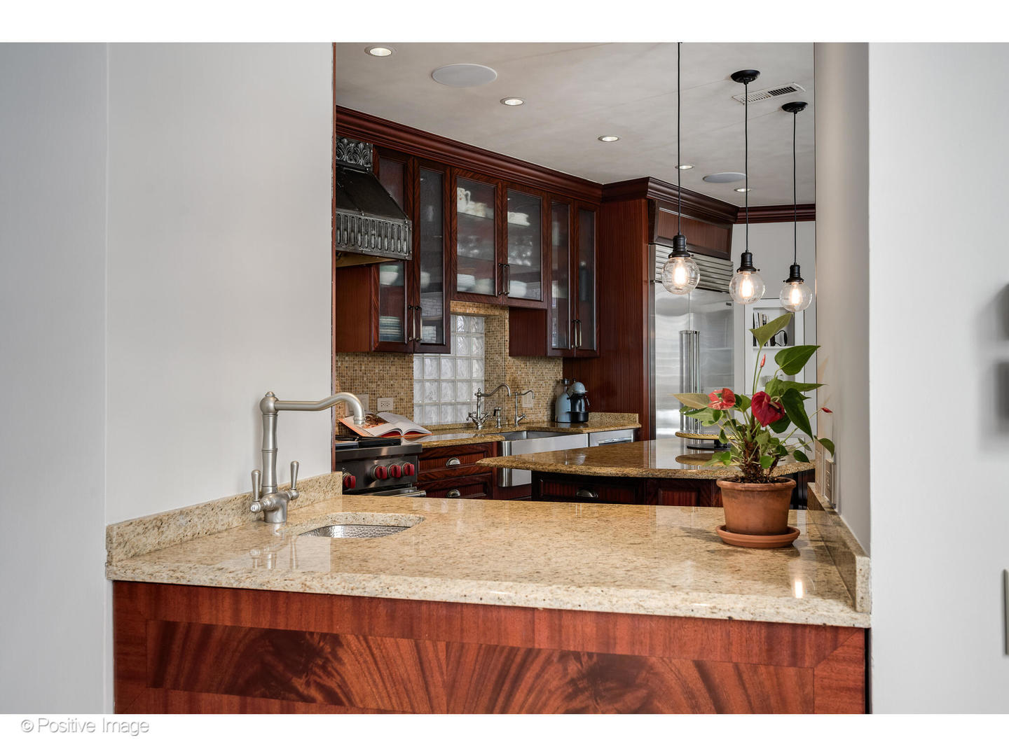 1811 North Howe Street Chicago, IL 60614 - Photo 12 of 42 a kitchen with a sink a counter and cabinets