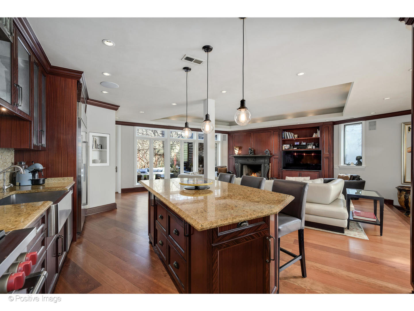 1811 North Howe Street Chicago, IL 60614 - Photo 15 of 42 a view of kitchen island kitchen island dining table and chairs
