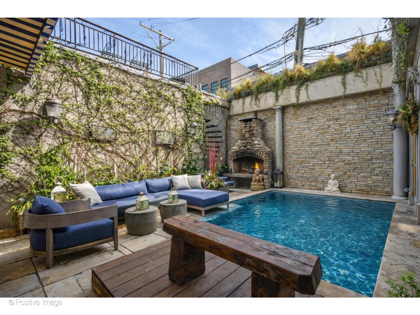 1811 North Howe Street Chicago, IL 60614 - Photo 20 of 42 a living room with furniture and a fireplace