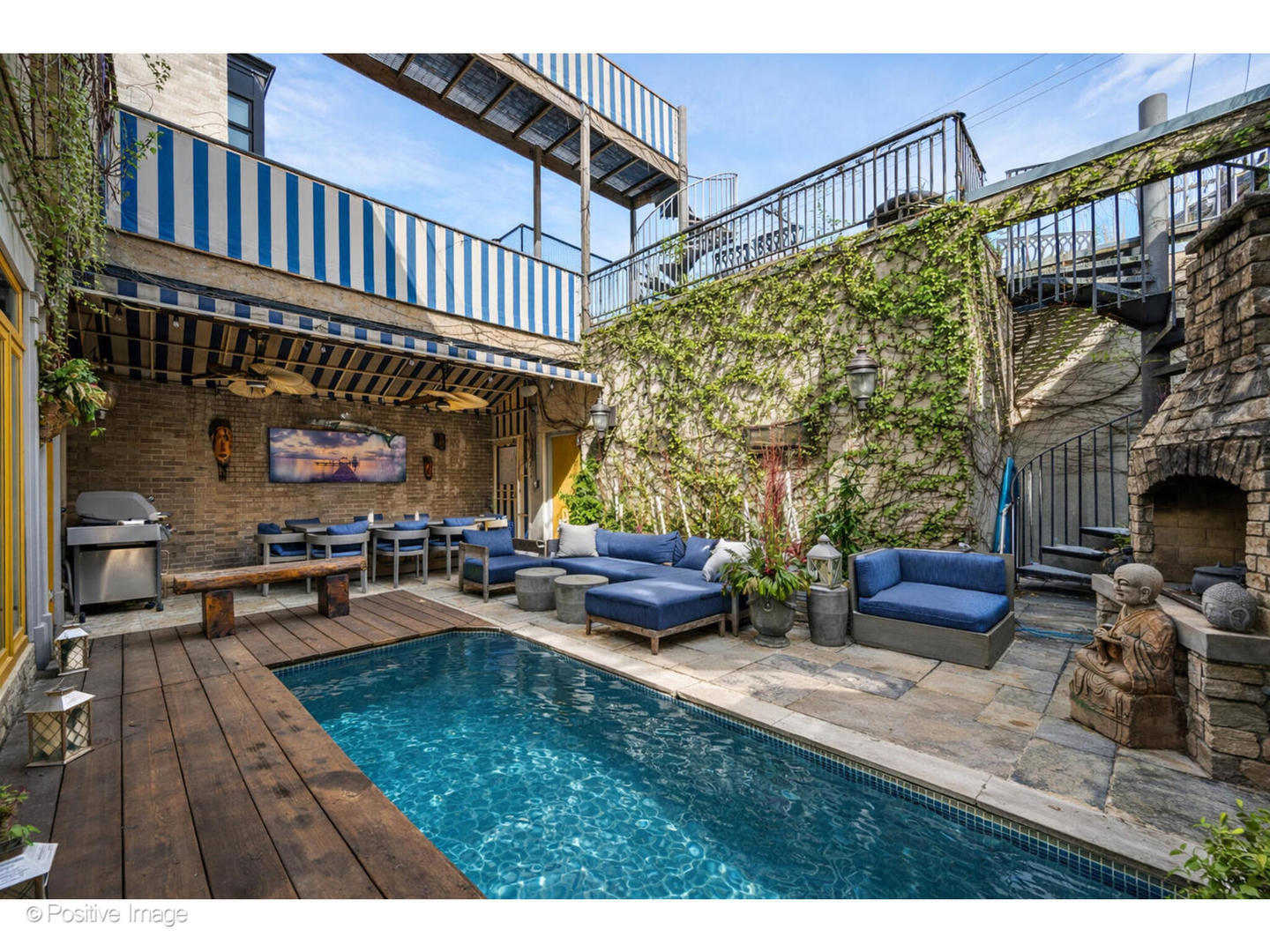 1811 North Howe Street Chicago, IL 60614 - Photo 21 of 42 a view of a patio with couches table and chairs and potted plants