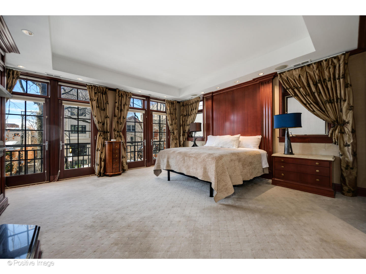 1811 North Howe Street Chicago, IL 60614 - Photo 25 of 42 a bedroom with bed and large window