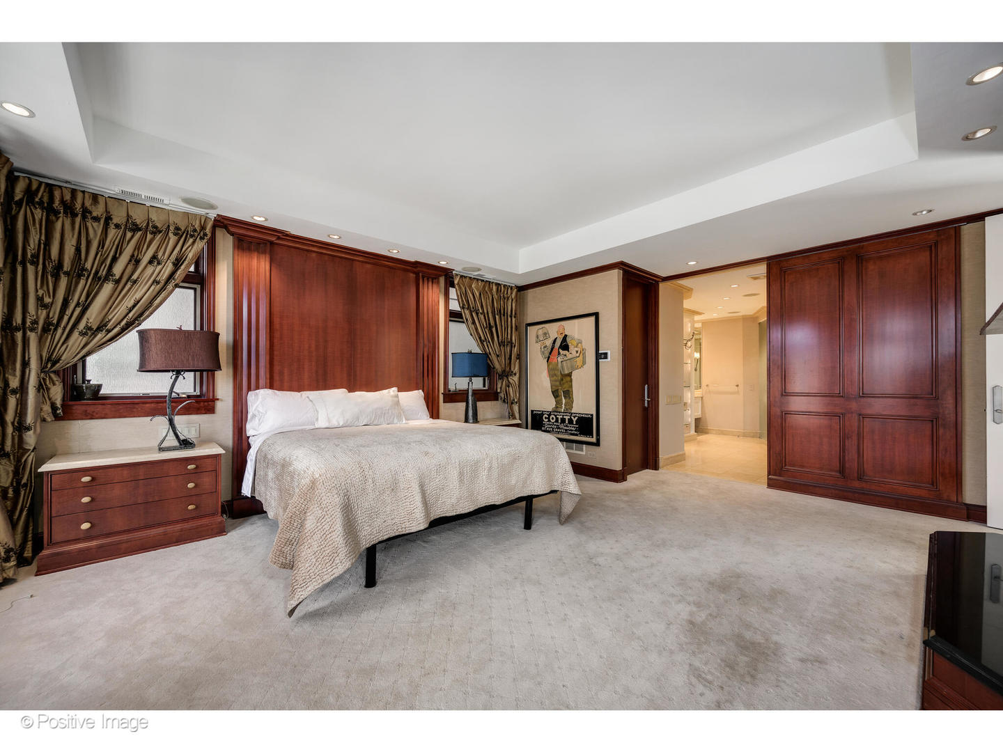 1811 North Howe Street Chicago, IL 60614 - Photo 27 of 42 a spacious bedroom with a bed and a dresser