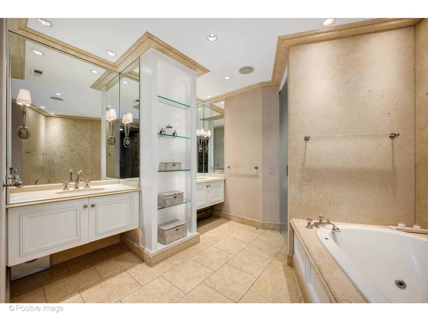 1811 North Howe Street Chicago, IL 60614 - Photo 28 of 42 a bathroom with a double vanity sink and mirror