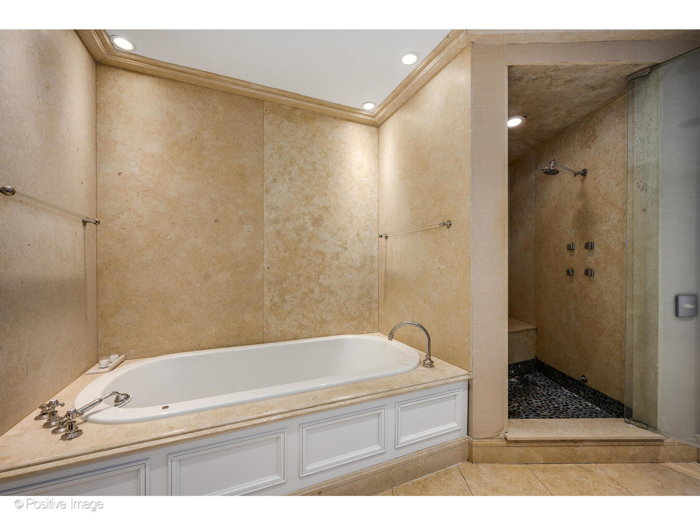 1811 North Howe Street Chicago, IL 60614 - Photo 29 of 42 a bathroom with a tub and a shower