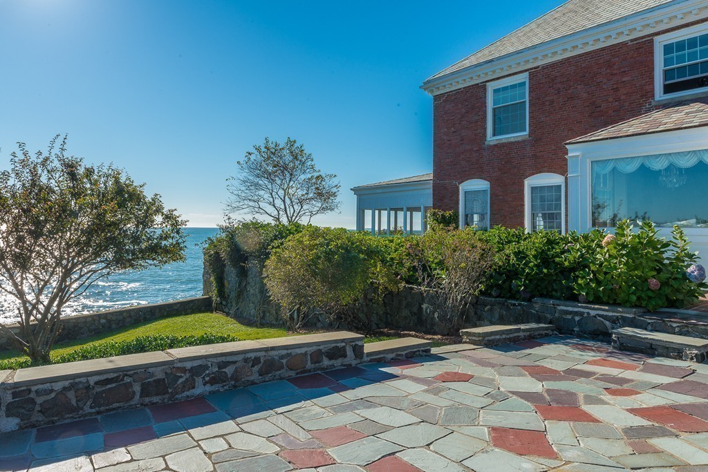 4 Coolidge Road Marblehead, MA 01945 - Photo 6 of 29 a view of backyard with outdoor seating and plants