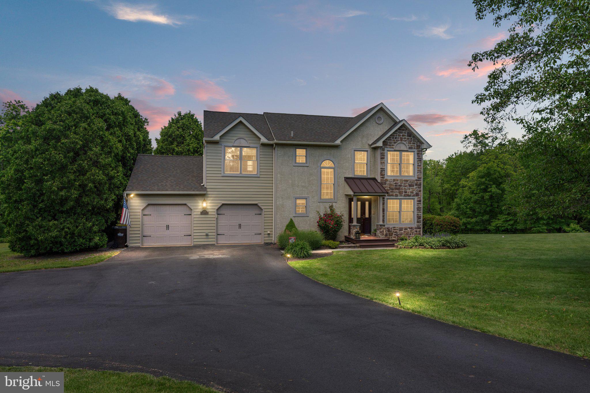 535 Richards Circle Pottstown, PA 19465 - Photo 1 of 44 a front view of a house with a yard and garage