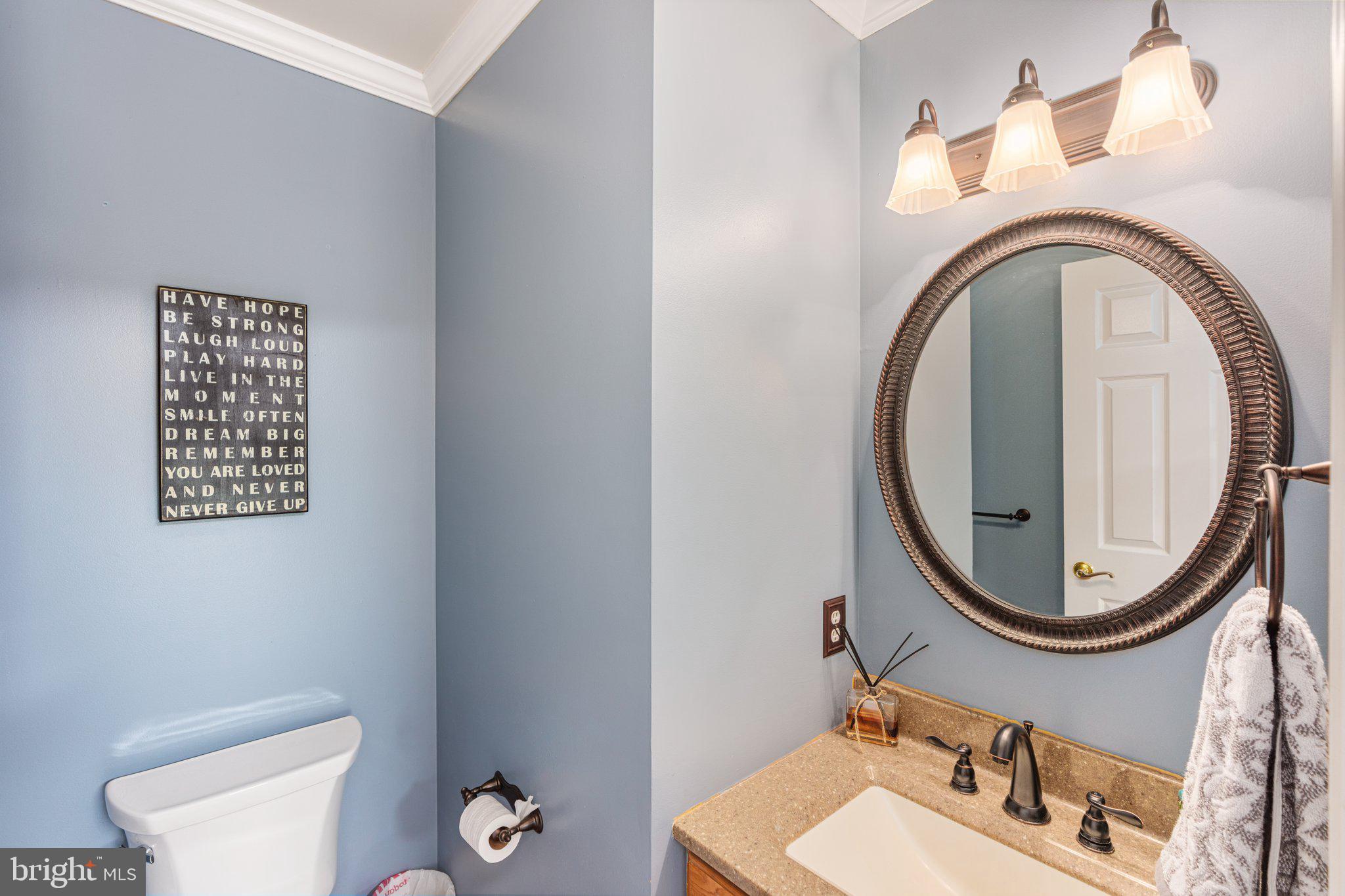 535 Richards Circle Pottstown, PA 19465 - Photo 19 of 44 a bathroom with a toilet a sink and a mirror