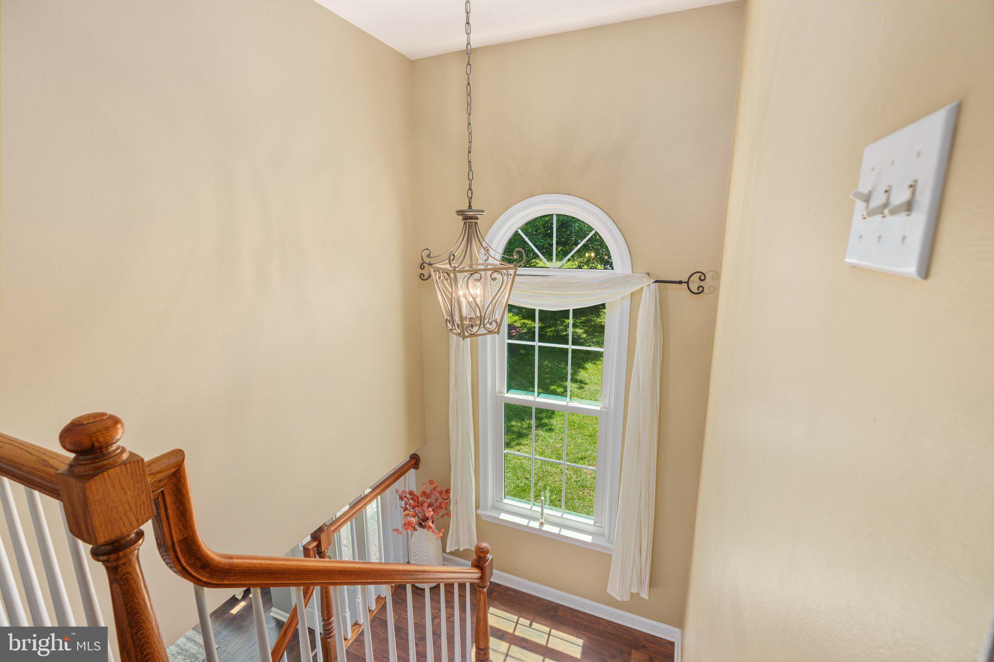 535 Richards Circle Pottstown, PA 19465 - Photo 20 of 44 a view of staircase with railing and a window