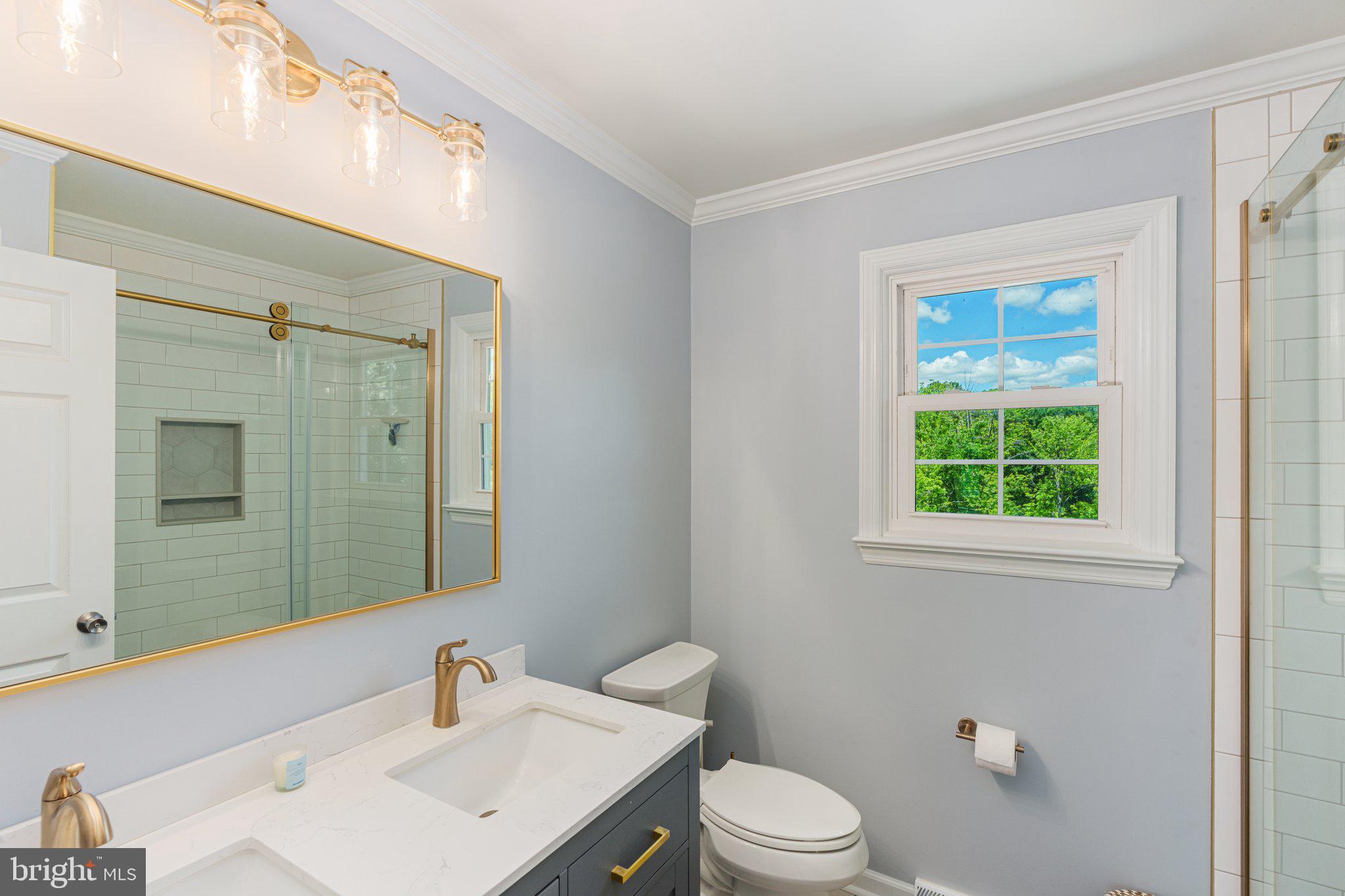 535 Richards Circle Pottstown, PA 19465 - Photo 23 of 44 a bathroom with a sink a toilet and a mirror