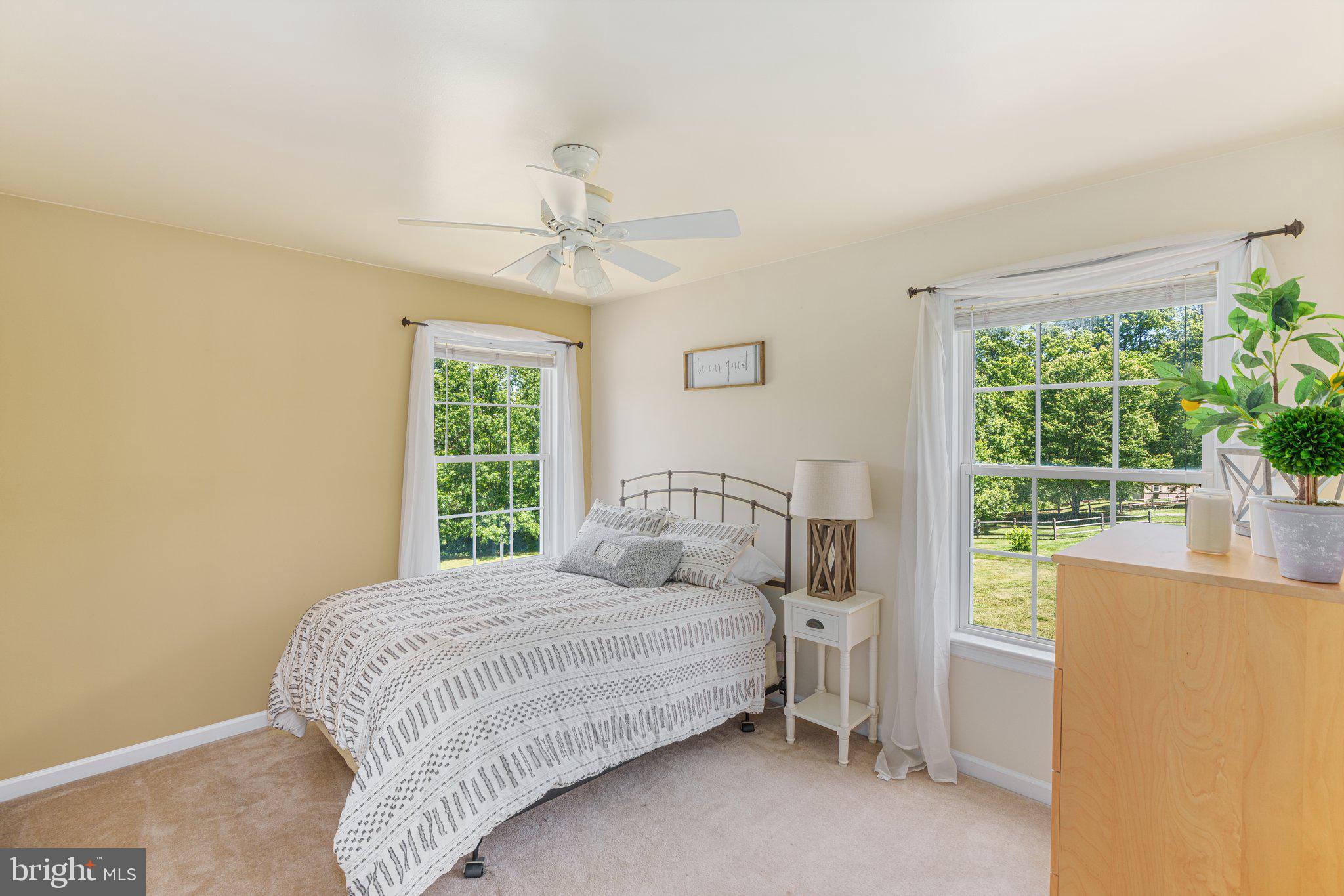535 Richards Circle Pottstown, PA 19465 - Photo 24 of 44 a bedroom with a large bed and a window