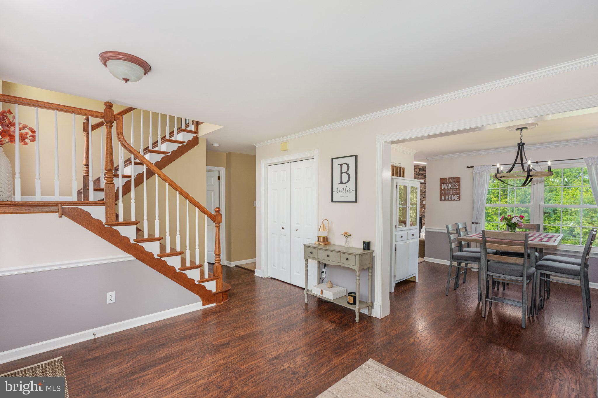 535 Richards Circle Pottstown, PA 19465 - Photo 7 of 44 a view of a livingroom with furniture wooden floor windows and a chandelier