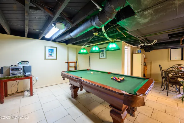 a view of a dining table with chairs and table