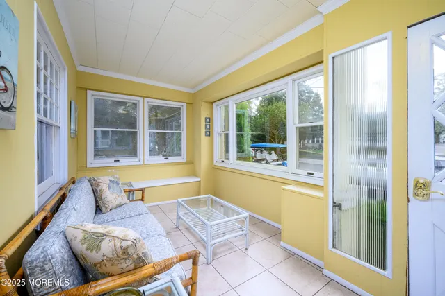 a living room with furniture and a table