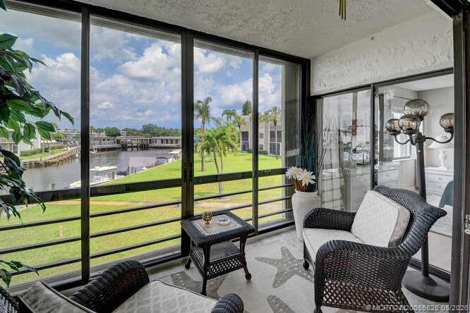 1950 Southwest Palm City Road, Unit 3209 Stuart, FL 34994 - Photo 13 of 64 Sliding doors for an all weather space.