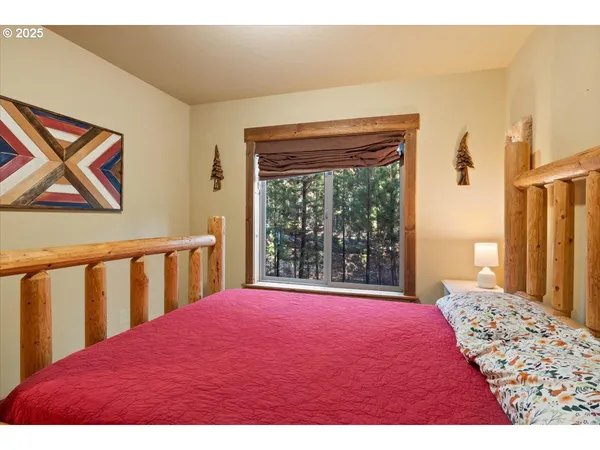 a large bedroom with a bed