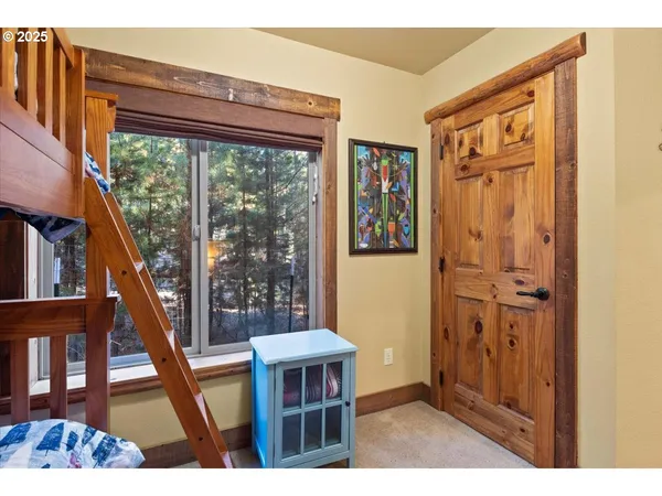 a view of a porch with furniture and front door