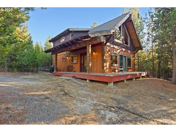a view of a large building in front of a house