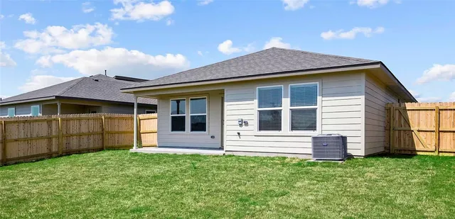a view of a lake with a big yard