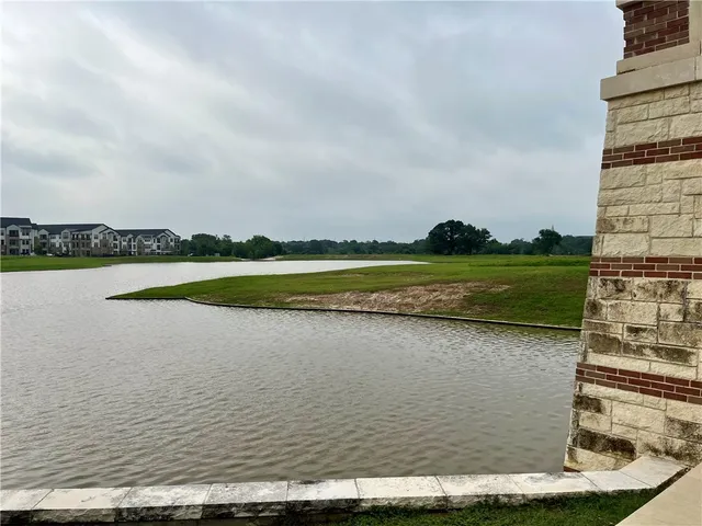 a view of a garden and mountains