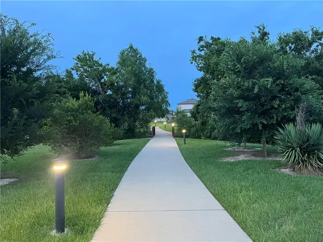 a view of a golf course with a lake