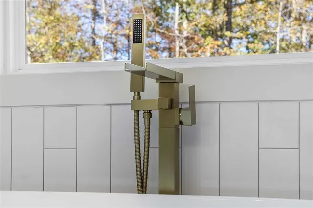 a front view of a house with parking space