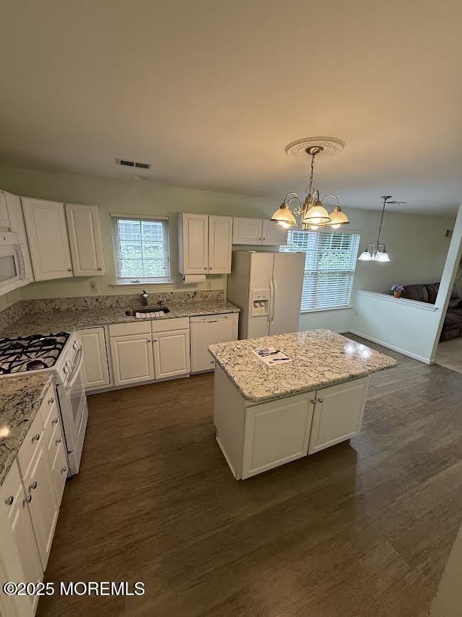 14 Pine Valley Road Lakewood, NJ 08701 - Photo 13 of 56 a kitchen with kitchen island granite countertop wooden cabinets and a counter top