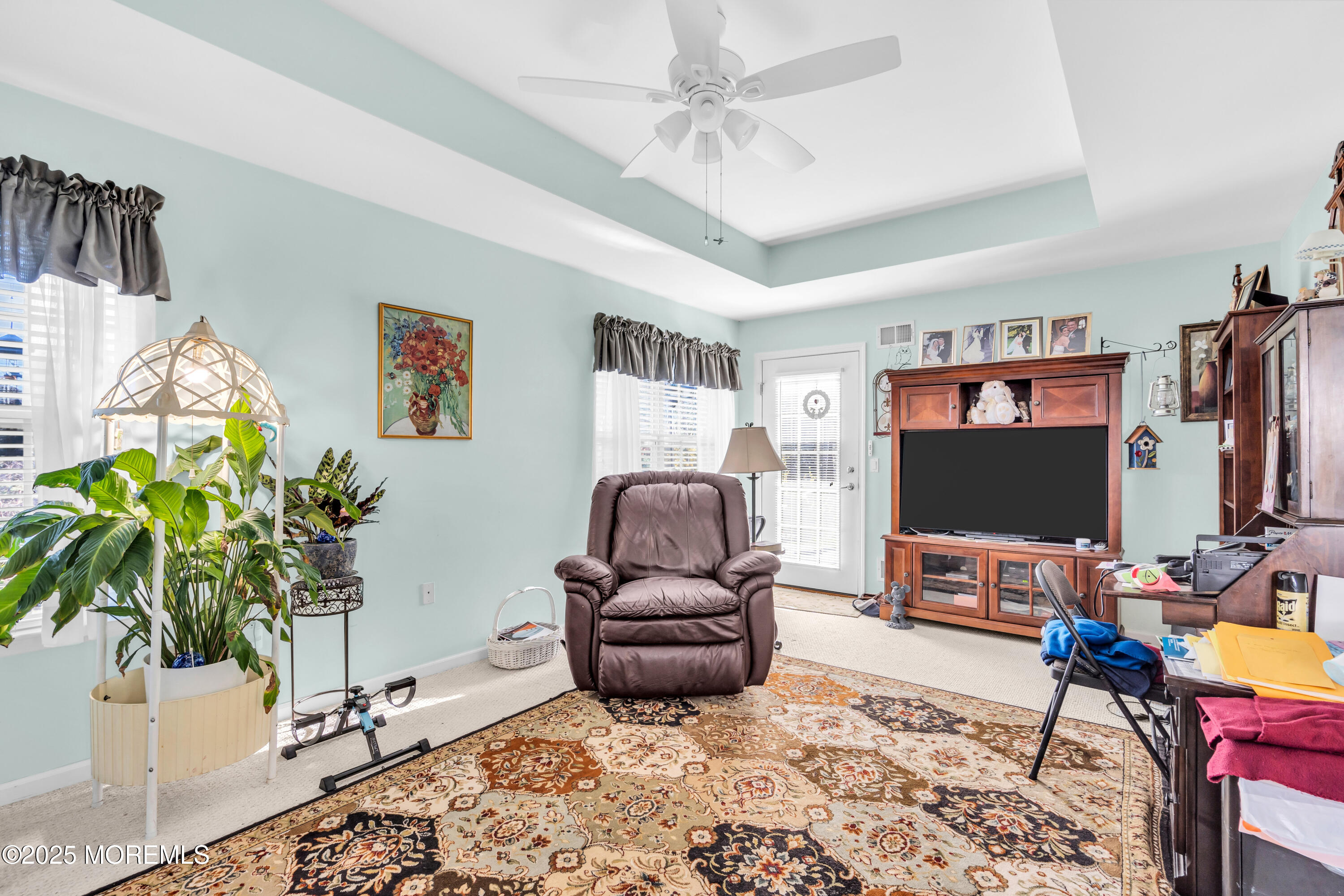 14 Pine Valley Road Lakewood, NJ 08701 - Photo 18 of 56 a living room with furniture and a flat screen tv