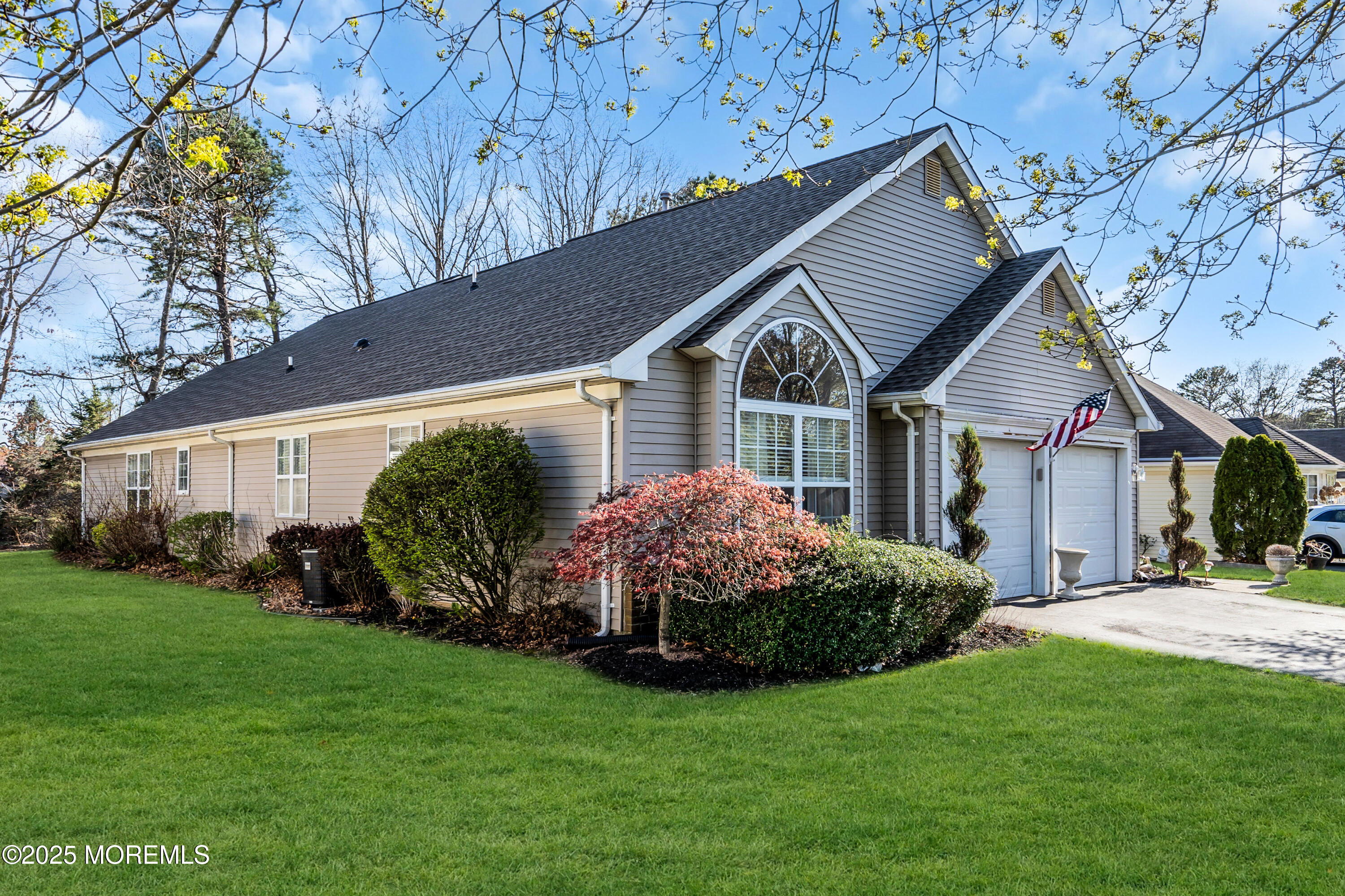 14 Pine Valley Road Lakewood, NJ 08701 - Photo 2 of 56 a front view of house with garden