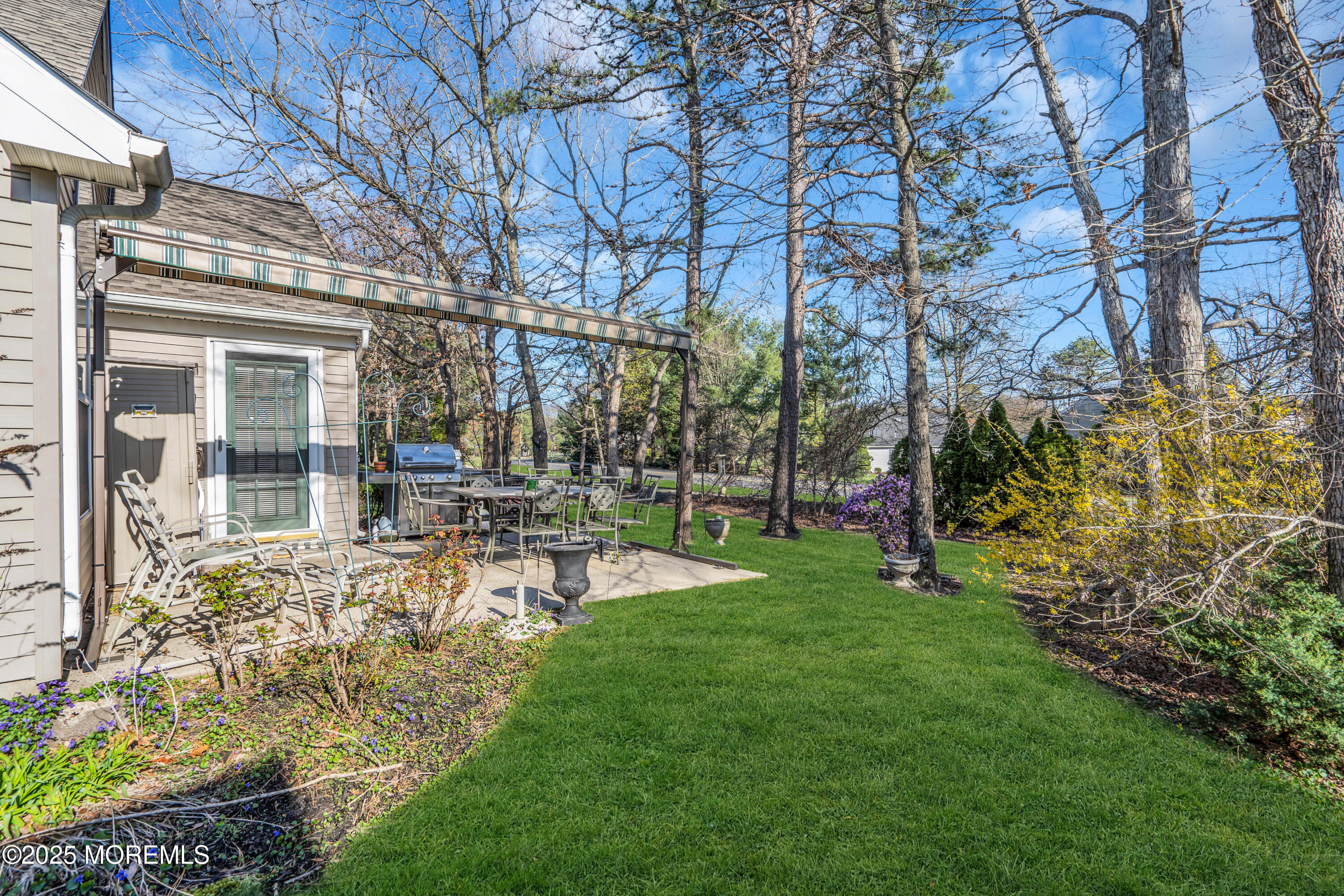 14 Pine Valley Road Lakewood, NJ 08701 - Photo 24 of 56 a view of a house with backyard and sitting area