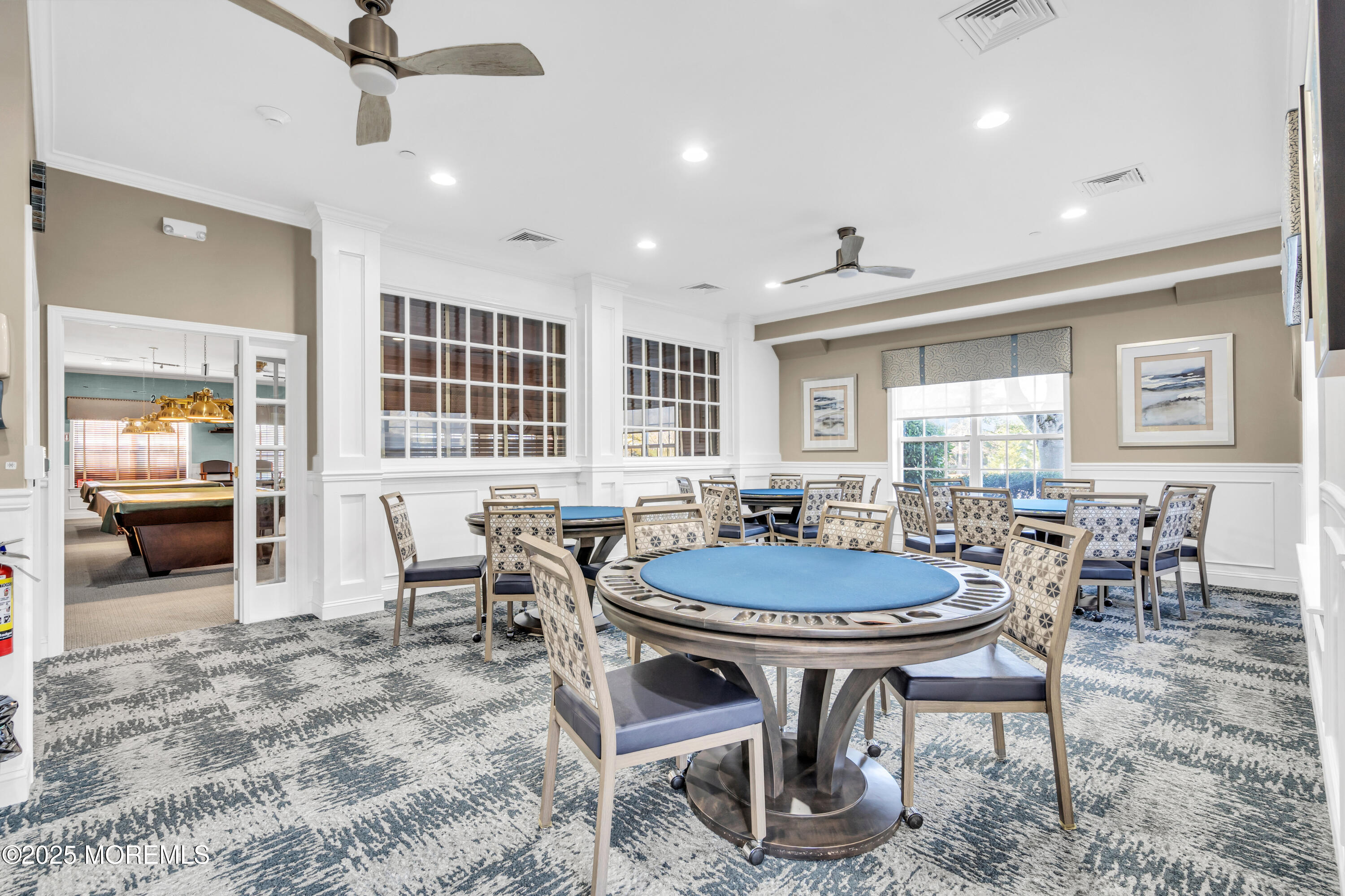 14 Pine Valley Road Lakewood, NJ 08701 - Photo 30 of 56 a dining room with furniture a rug and chandelier