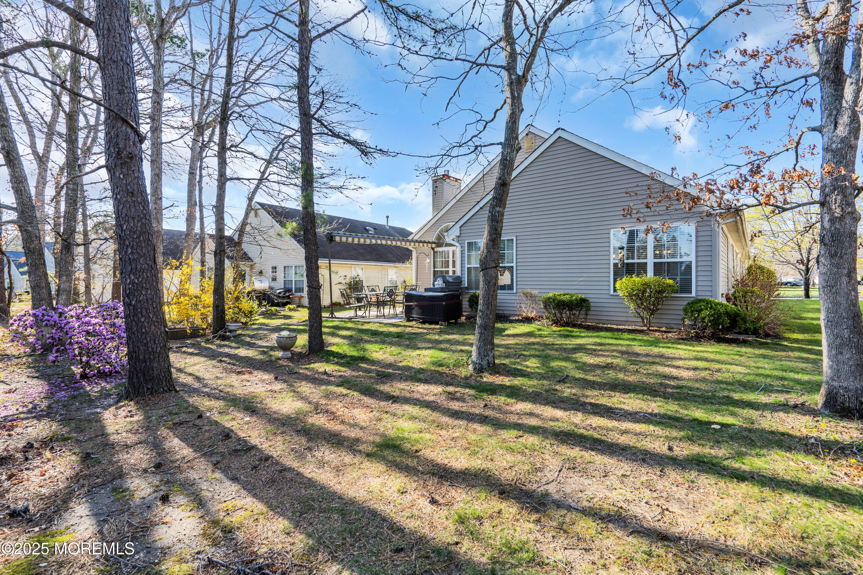 14 Pine Valley Road Lakewood, NJ 08701 - Photo 46 of 56 a view of a house with backyard and a tree