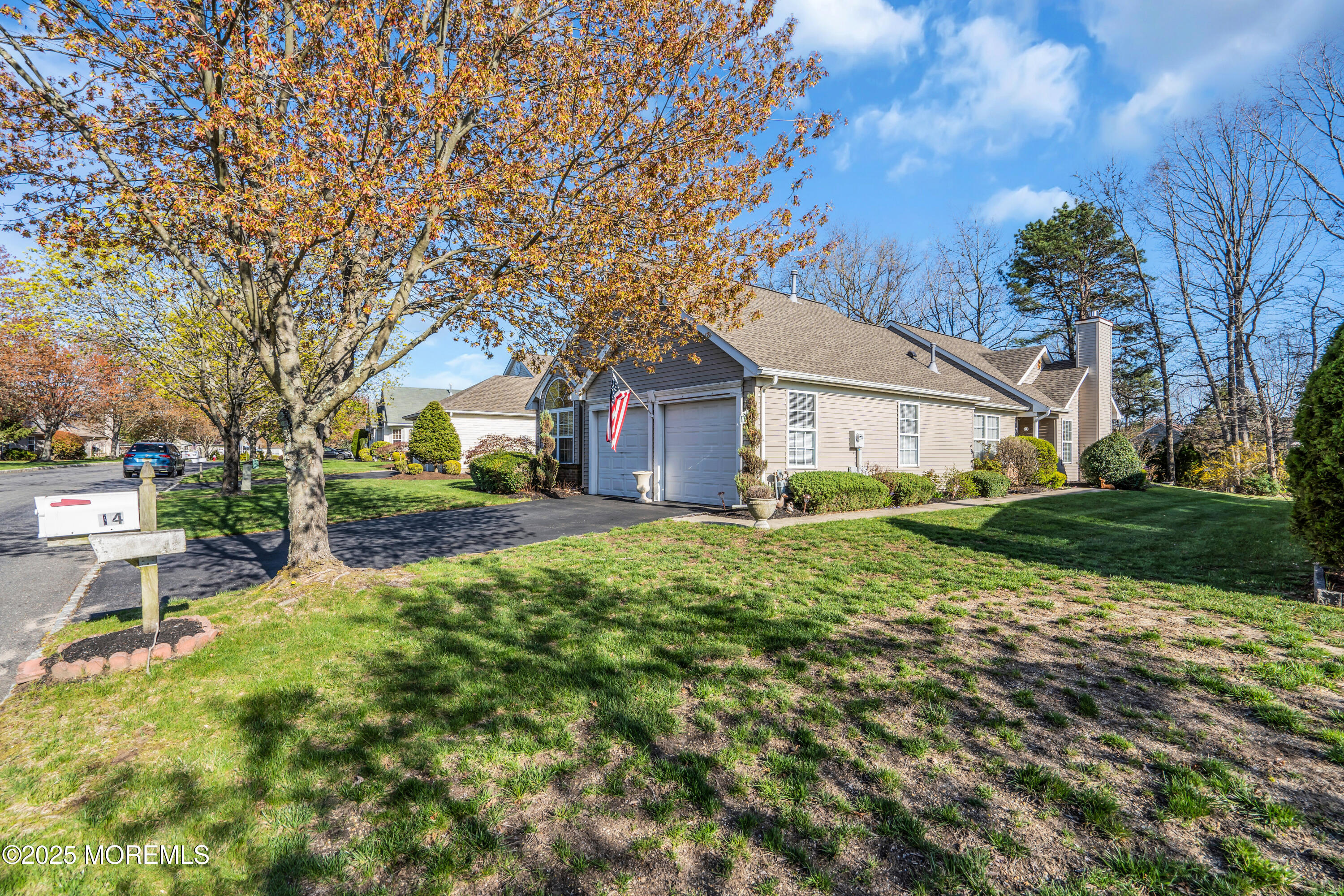 14 Pine Valley Road Lakewood, NJ 08701 - Photo 52 of 56 a view of a yard with a house in the background
