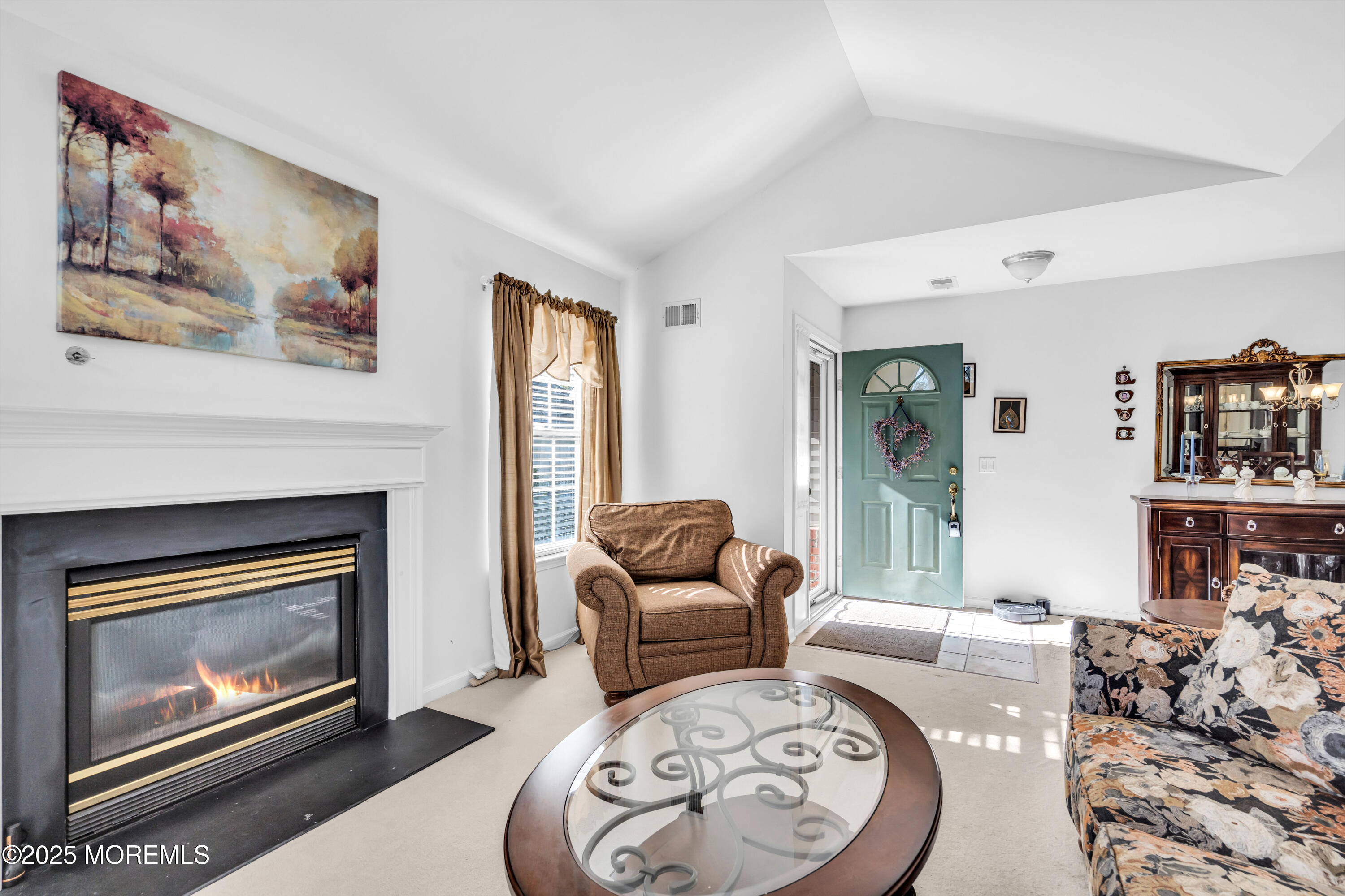 14 Pine Valley Road Lakewood, NJ 08701 - Photo 9 of 56 a living room with furniture and a fireplace