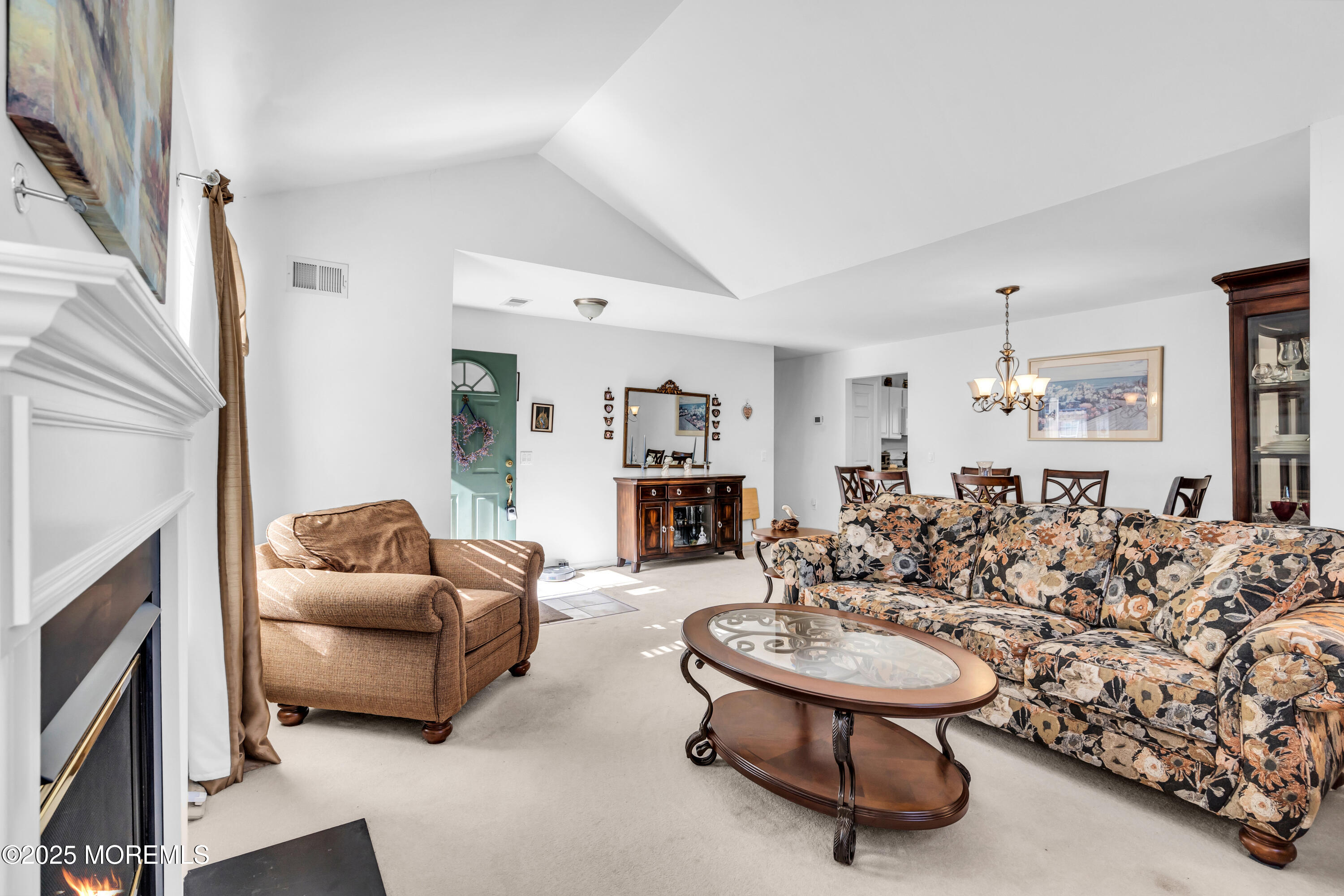 14 Pine Valley Road Lakewood, NJ 08701 - Photo 10 of 56 a living room with furniture and a fireplace