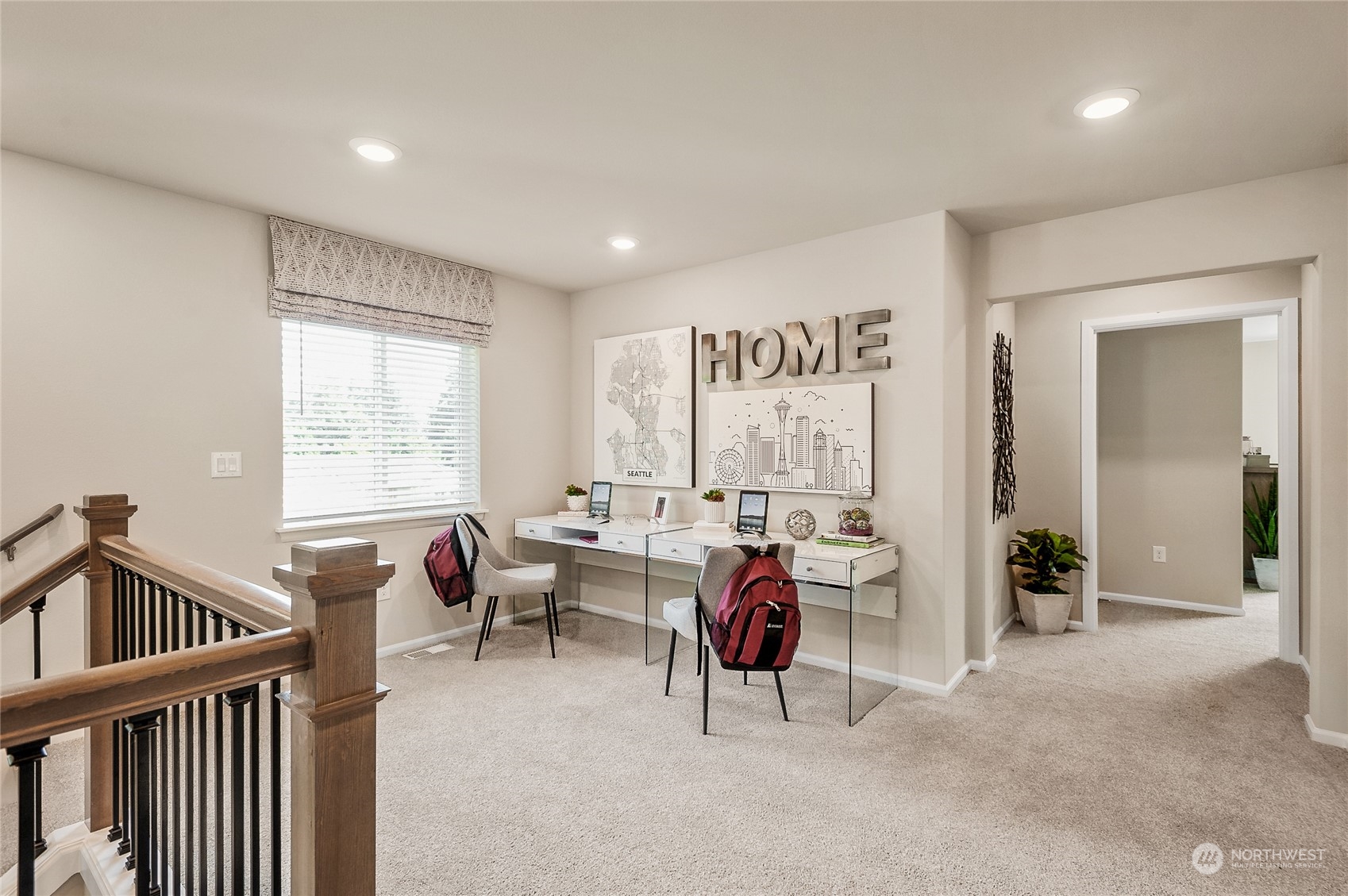 131 179th Street Southeast, Unit 3 Bothell, WA 98012 - Photo 6 of 16 a view of a livingroom with workspace and a window