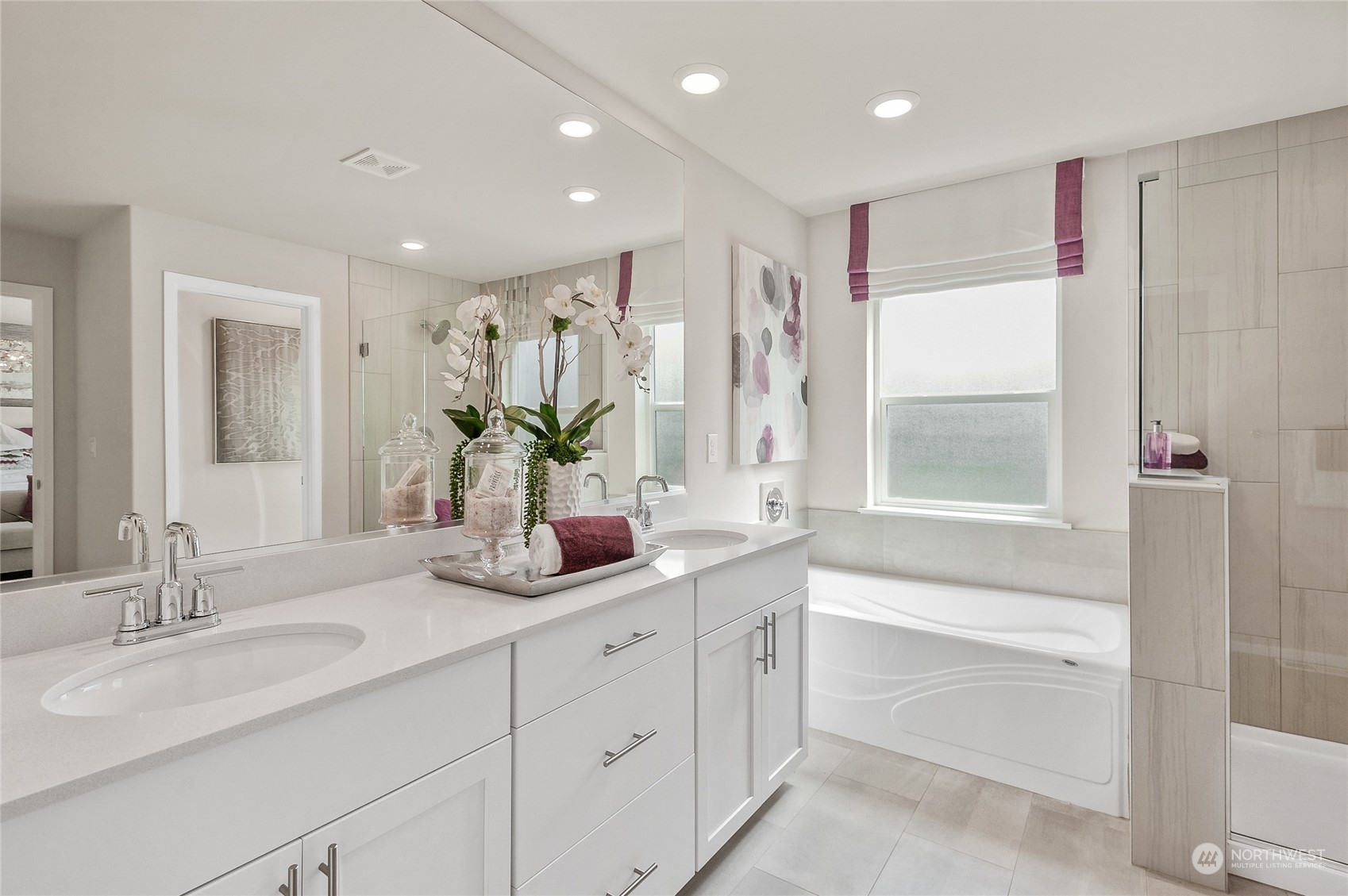 131 179th Street Southeast, Unit 3 Bothell, WA 98012 - Photo 7 of 16 a bathroom with a double vanity sink window and