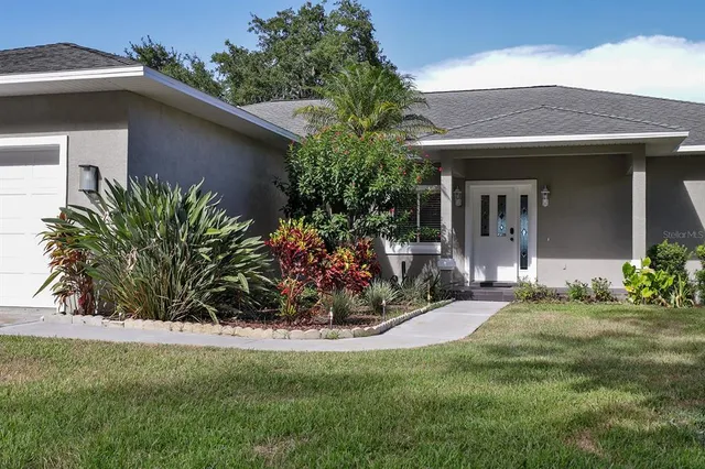 a view of a house with patio