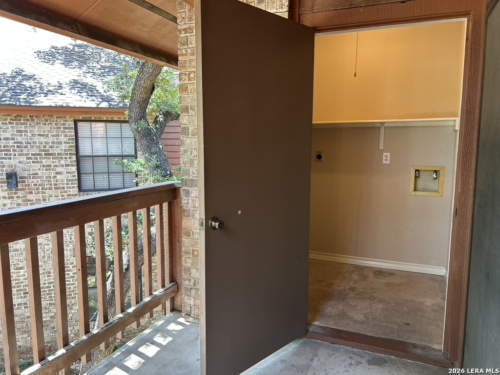 13018 Heimer Road, Unit 710 San Antonio, TX 78216 - Photo 21 of 27 a view of a glass door with a door