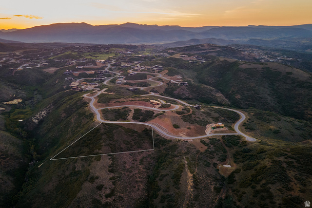 9269 North Sunset Road Kamas, UT 84036 - Photo 19 of 21 Expansive mountain terrain with a defined property outline, featuring winding paved roads and distant residential structures