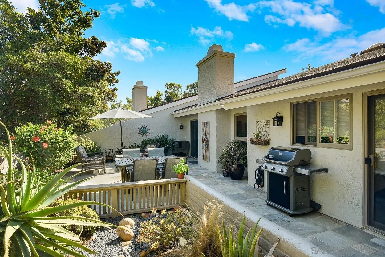 5625 Caminito Isla La Jolla, CA 92037 - Photo 20 of 29 a view of a patio with couches chairs and potted plants