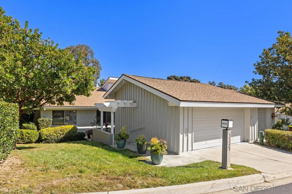 5625 Caminito Isla La Jolla, CA 92037 - Photo 23 of 29 a front view of a house with garden