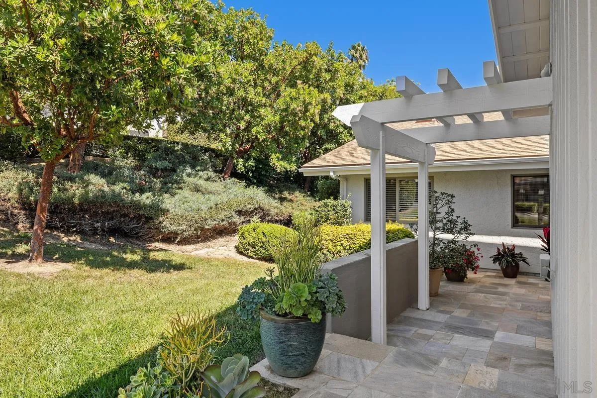 5625 Caminito Isla La Jolla, CA 92037 - Photo 24 of 29 a front view of a house with a porch