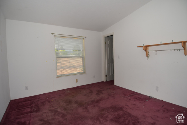 580 East 400 North Spring City, UT 84662 - Photo 14 of 40 Unfurnished room featuring carpet and lofted ceiling