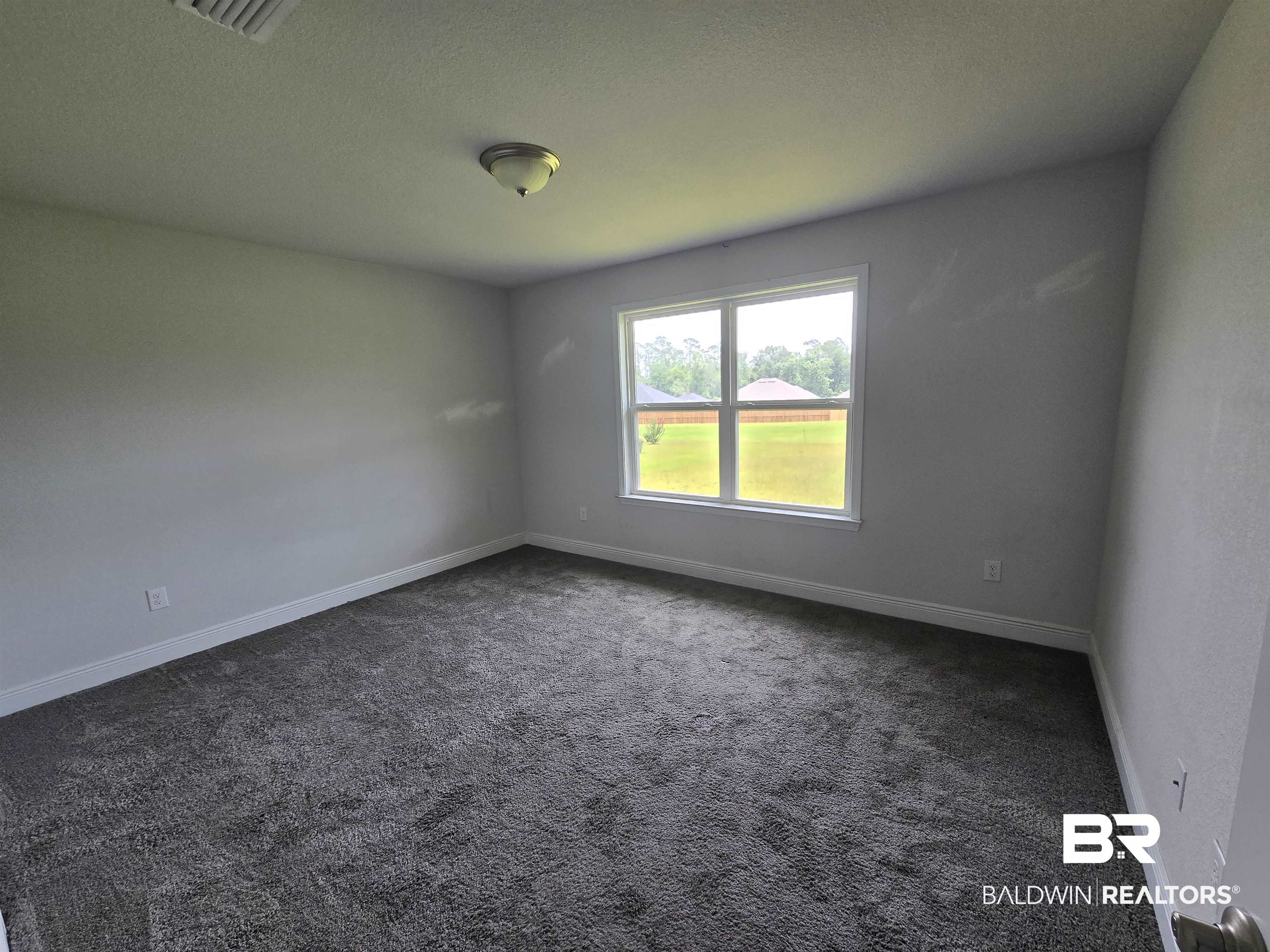 23035 Ridgewood Drive Robertsdale, AL 36567 - Photo 14 of 17 Guest Bedroom 3
