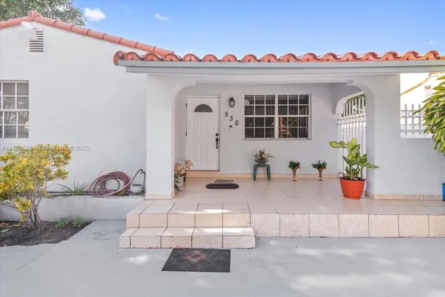 a view of lobby with furniture and potted plant