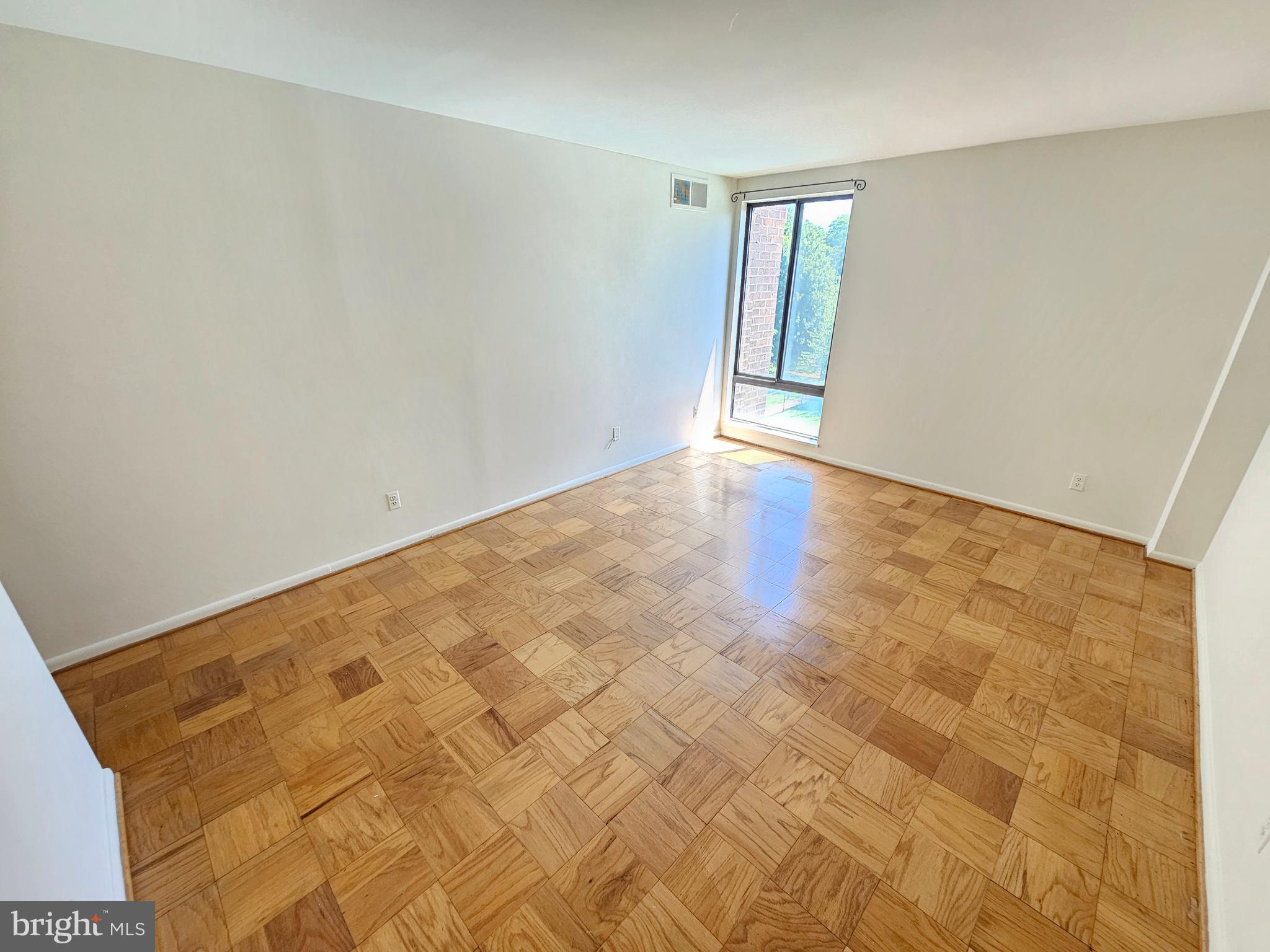 9900 Georgia Avenue, Unit 310 Silver Spring, MD 20902 - Photo 27 of 30 Primary Bedroom