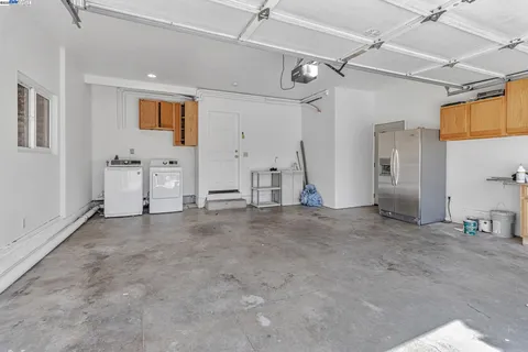 a view of a livingroom with wooden furniture