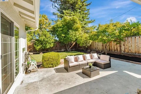 a outdoor living space with furniture and garden