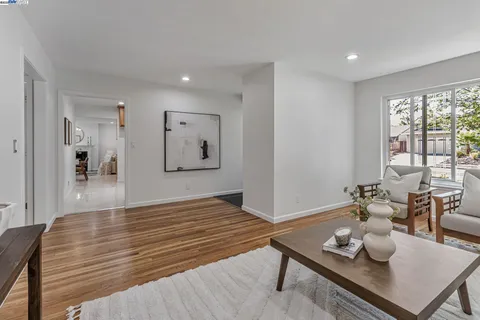 a living room with furniture and window
