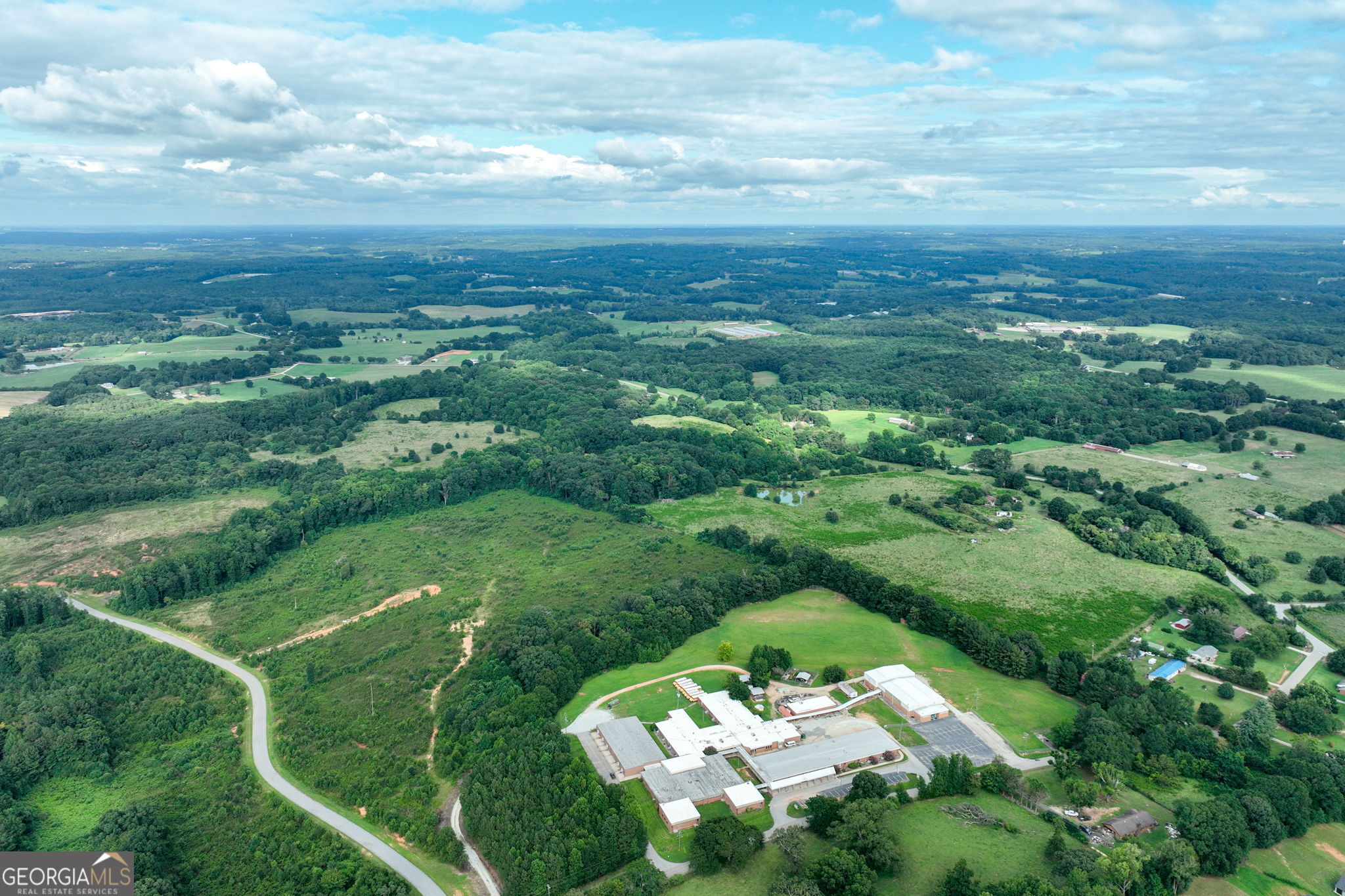 0 Turkey Creek Road Carnesville, GA 30521 - Photo 12 of 28 an aerial view of a residential houses with outdoor space and trees